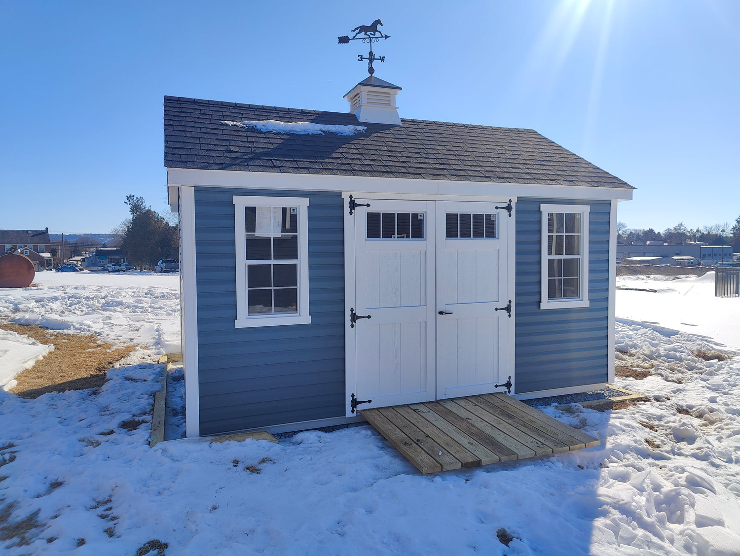 Why House Wrap Is a Must-Have Under Vinyl Siding on Your Shed 🛡️🏠
